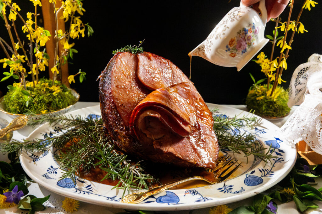Photo of Dijon Honey Glazed Ham with gravy poured on top